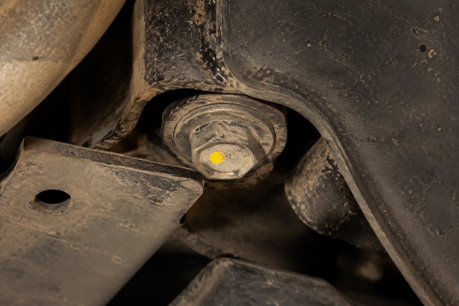 Fresh corrosion on a subframe bolt